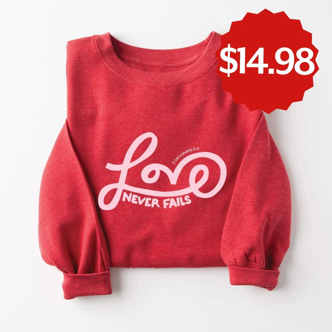 Love Never Fails Sweatshirt